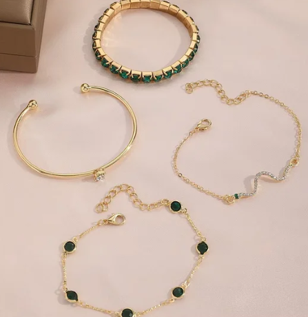 Set di 4 bracciali in oro e cristallo di smeraldo