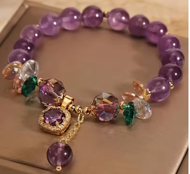 Bracciale con perline di cristallo viola e pietra naturale