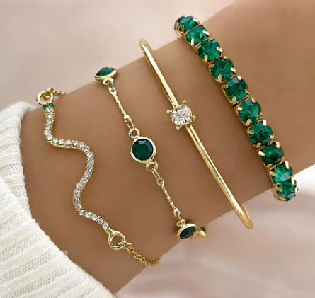 Set di 4 bracciali in oro e cristallo di smeraldo